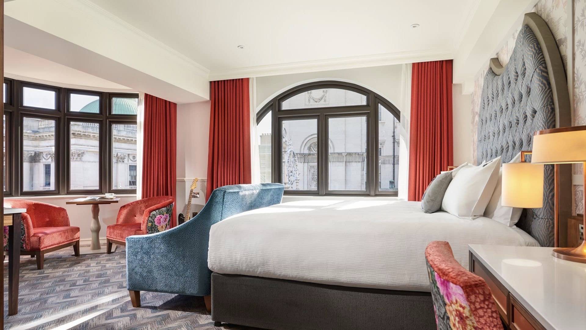 Hard Rock Hotel is one of the best design hotels in Dublin showing room with guitar and city views 