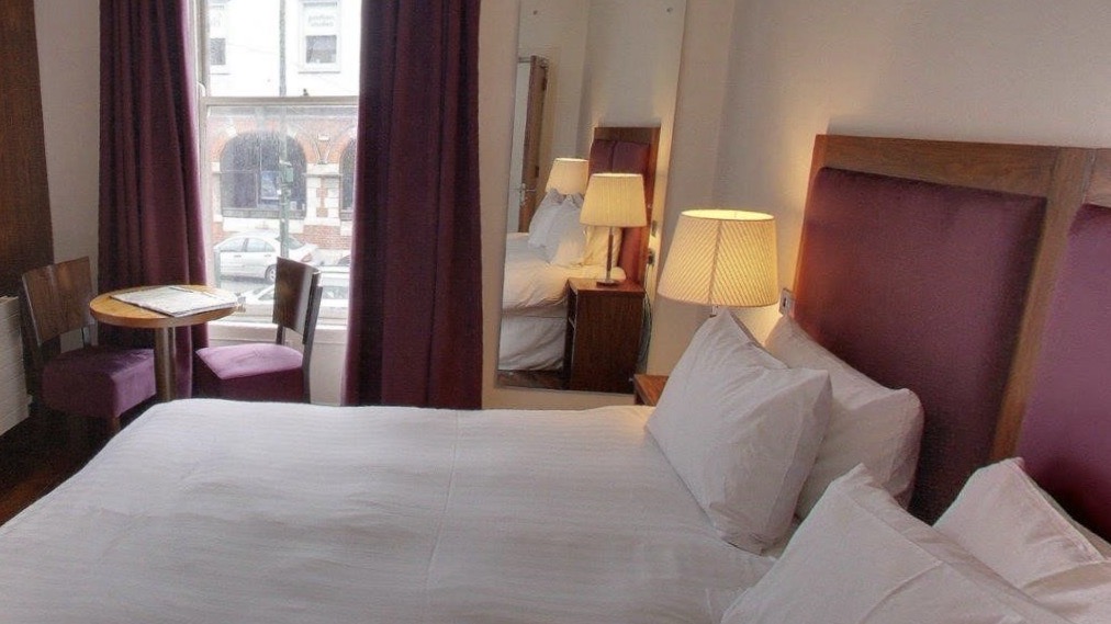 The Lombard bedroom with city view one of the best pub hotels in dublin