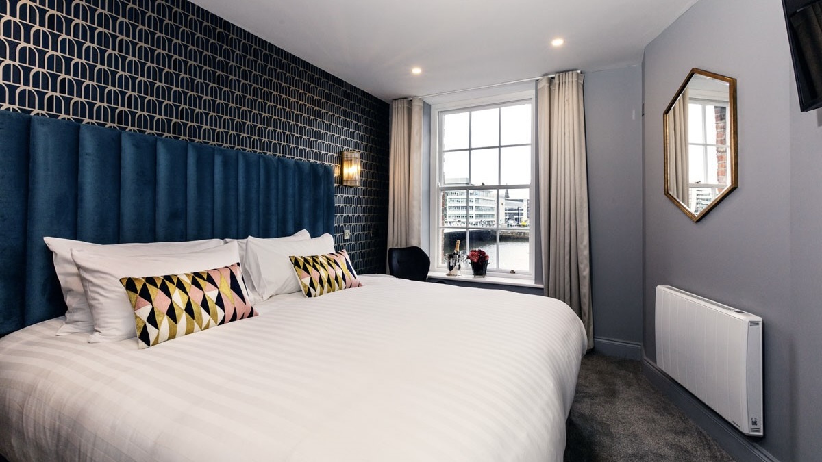 The Ferryman Townhouse water view and bed at one of the best Dublin Townhouse hotels